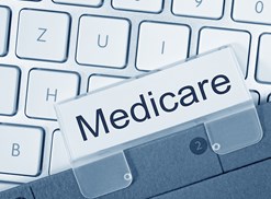 Label of medicare sitting on a keyboard