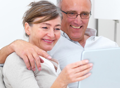 Retiring couple examining their 401k plans