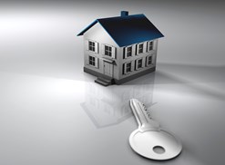 small house looming over a key